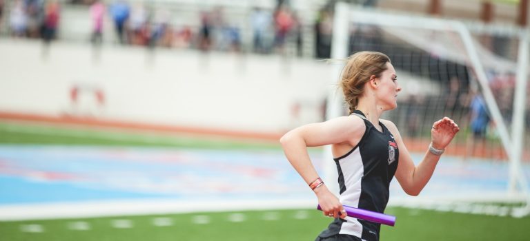 woman running on field